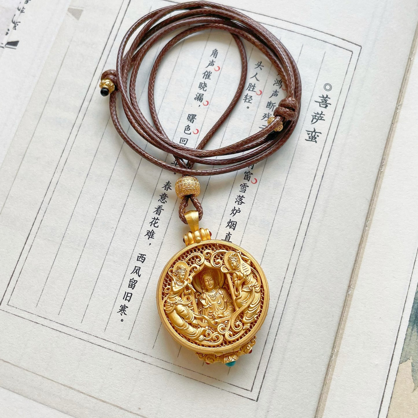 Handcrafted Silver Gold-Plated Dunhuang Flying Apsaras Guanyin Pendant · Openwork Carved Design · Adjustable Brown Cord
